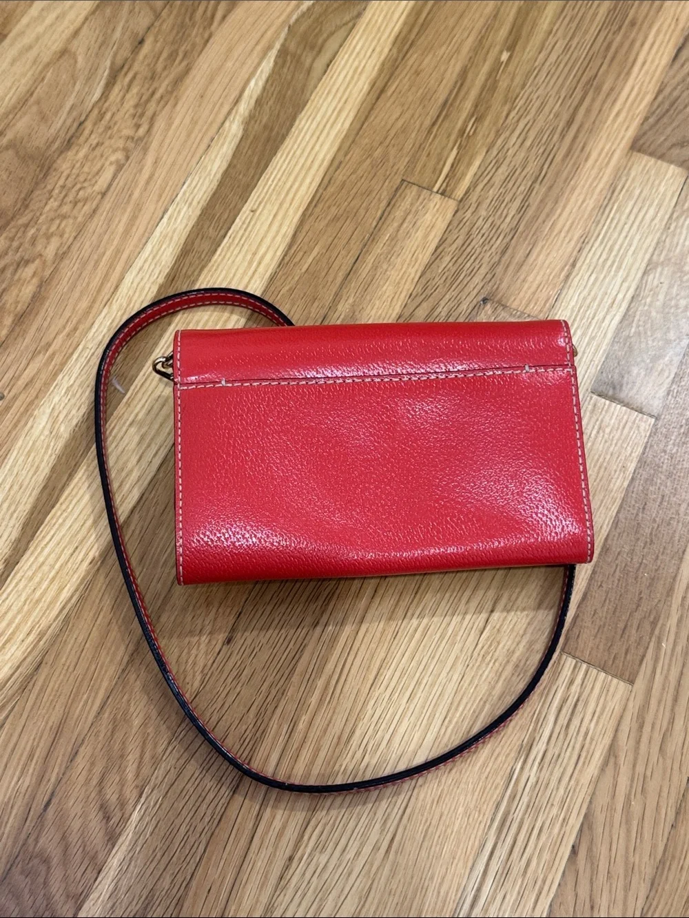 kate spade Red Pebbled Leather Crossbody Wallet with Gold Logo Plate